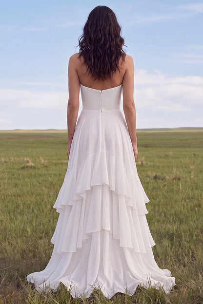 Strapless Ivory A Line Sweep Train Ruffled Beach Wedding Dress with Slit