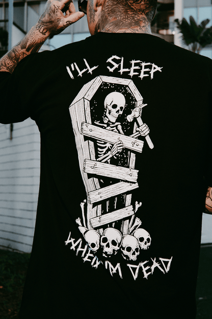 Never Sleepin' graphic tee — back graphic of skeleton nailing planks into a coffin, I'll Sleep When I'm Dead print