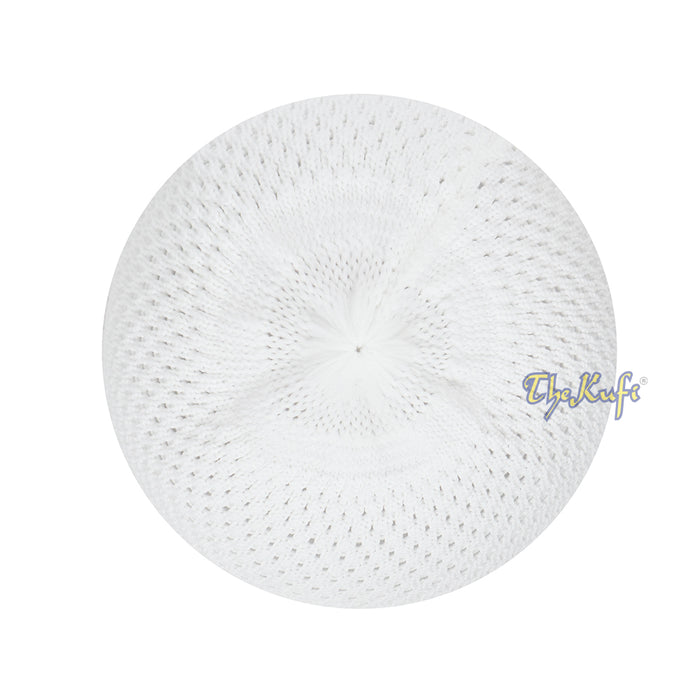 White knitted Islamic prayer cap (kufi) with breathable mesh pattern.